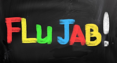 Flu jab - written in different colours on a blackboard